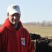 Josh Wolbeck, who is new to the organic farming industry, stands by his herd of cows on his family’s farm outside of Sauk Centre. As of this fall, Wolbeck’s entire farm, including 223 acres of tillable land and 60 dairy cows, is certified organic. Wolbeck hopes the transition will provide a more stable income for him as the market for conventional milk continues to fluctuate.