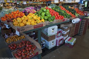 Bell peppers in four colors: green, yellow, orange and deep red.