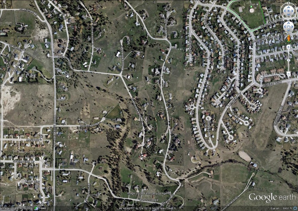 The center of this photo shows what one unit per acre development looks like.