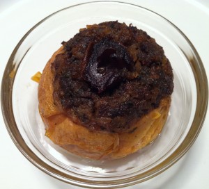 Quince stuffed with lamb and rice, topped with a dried date