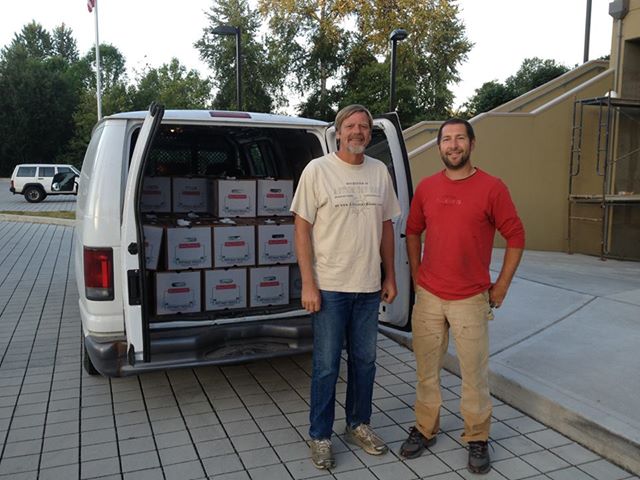 Erick and Matt Tregoning, Sol to Seed Farm, making a delivery for the Snoqualmie Valley Farmers Cooperative (Photo credit: 21 Acres)