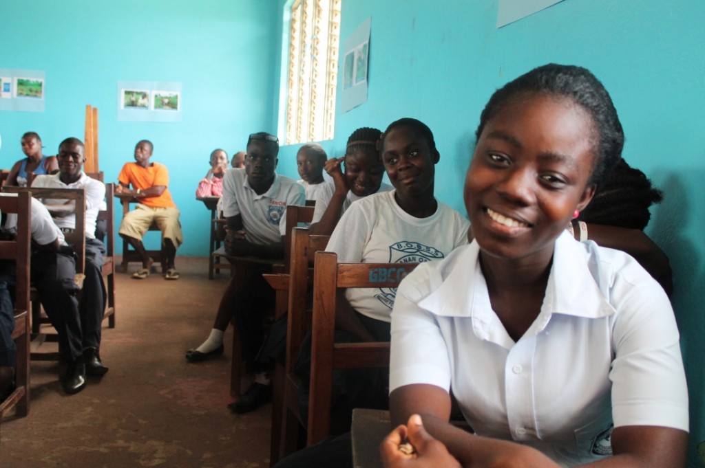 In the classroom, learning "reading, writing, and arithmetic."