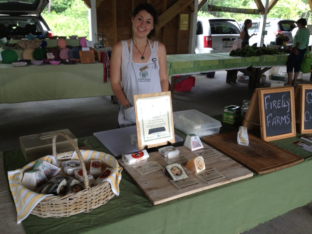 Manning (personing?) the Firefly Creamery cheese table at the Oakland farmers market