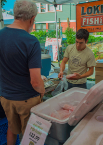 Keeping the fish moving at the farmers market.